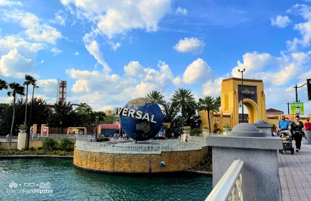 Universal Orlando Resort Globe in front of Universal Studios Arches and Hollywood Rip Ride Rockit. Keep reading to get the best Universal Studios photos.