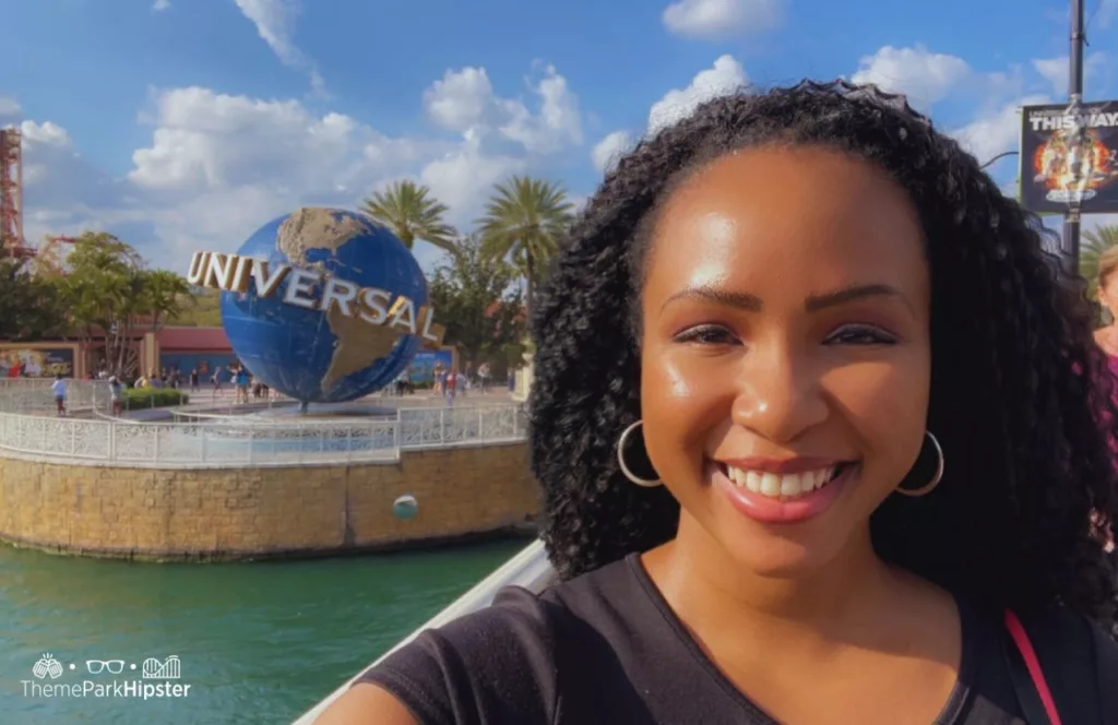 Universal Orlando Resort Globe in front of Universal Studios Arches and Hollywood Rip Ride Rockit with NikkyJ. Keep reading to get the best things to do at Universal Studios Florida.