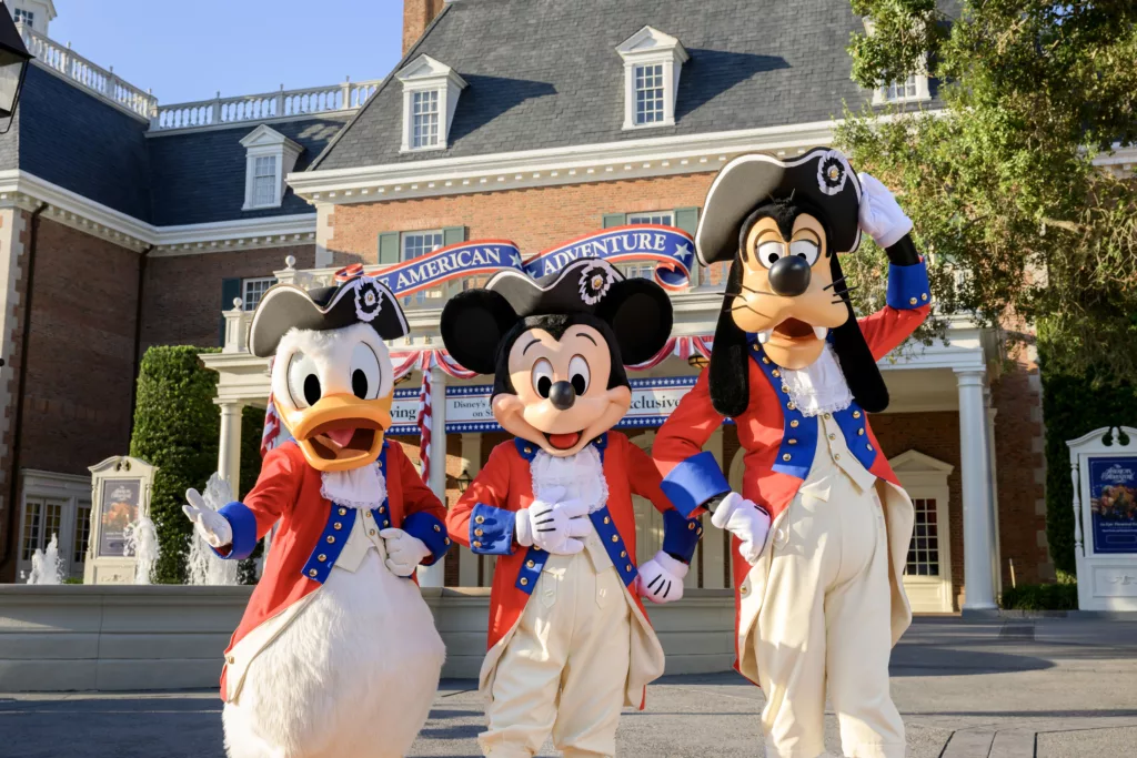 Donald Duck, Mickey Mouse and Goofy Dress in their Patriotic Best for the 4th of July at Disney World. Keep reading to get the Best Disney World 4th of July Shirts and Merchandise.
