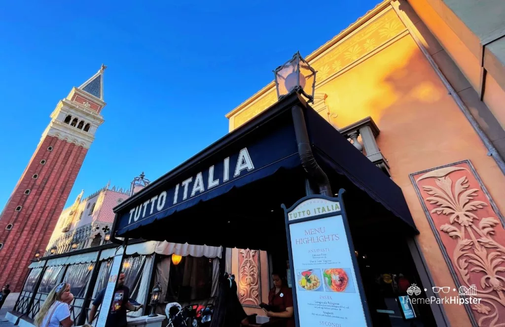 Epcot Italy Pavilion Tutto Italia and Tutto Gusto Restaurant Wine Cellar entrance with menu highlights out front. Keep reading to discover the 25 most romantic things to do at Disney World for couples. 