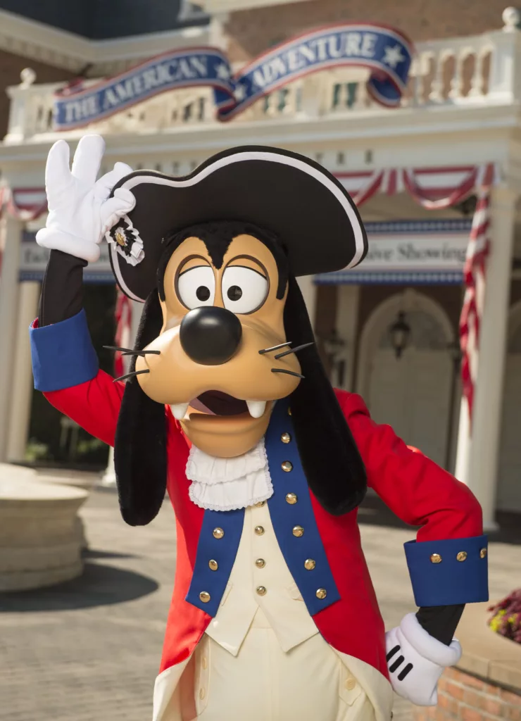 Fourth of July at Walt Disney World Resort with Goofy dresses in his patriotic best. Keep reading to get the Best Disney World 4th of July Shirts and Merchandise.