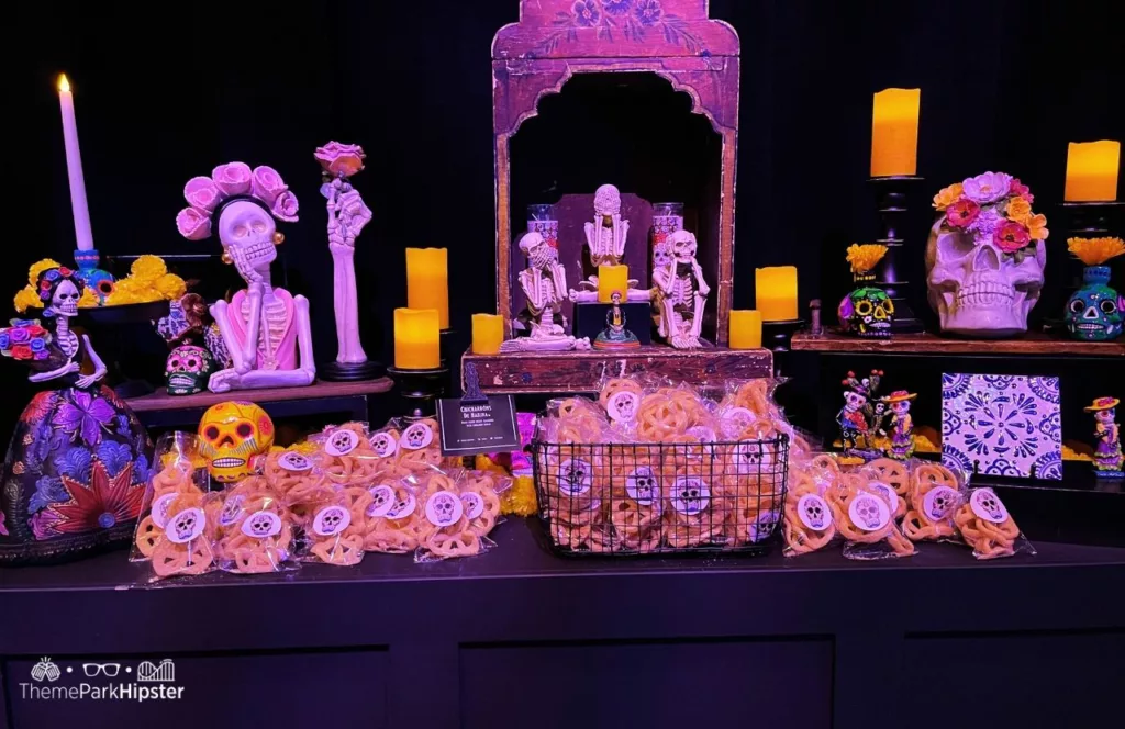 Chicharrons De Harina Dessert adorned with day of the dead decor at Universal Orlando Resort Halloween Horror Nights during a Taste of Terror HHN.  Keep reading to discover more about Halloween at Universal Orlando.