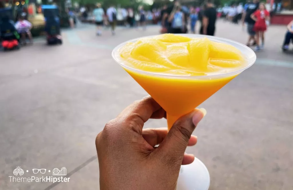 Epcot Food and Wine Festival at Disney Les Vins des Chefs de France at France Pavilion Grand Marnier Orange Slush. Keep reading for the best Epcot drinking around the world passport ideas!