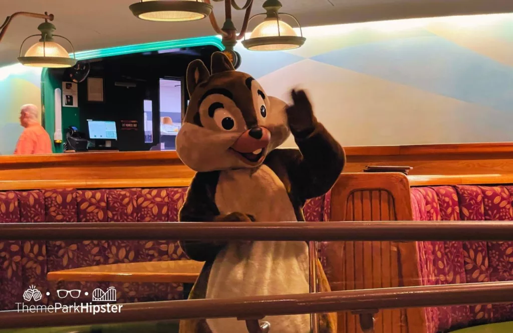 Epcot Food and Wine Festival at Disney The Land Pavilion Garden Grill with Chip and Dale Character Meet and Greet Buffett. One of the best epcot table service restaurants at Disney World.