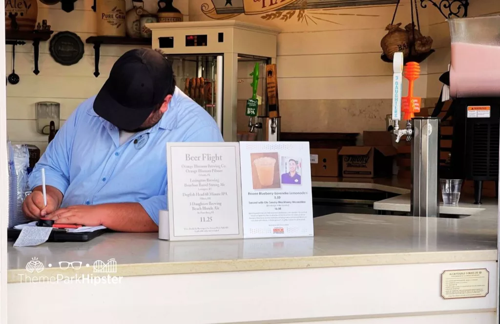 2024 Epcot Food and Wine Festival at DisneyBlock and Hans Beer Booth with Frozen Blueberry Lavender Lemonade