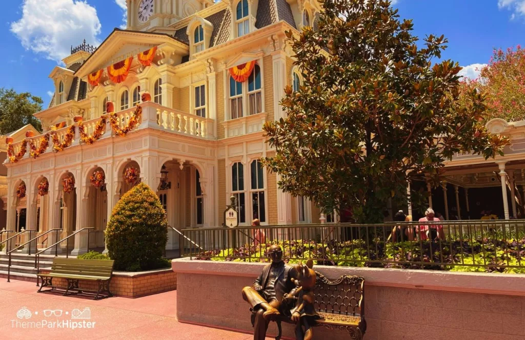 Disney Magic Kingdom City Hall Main Street USA with Partners Statue Roy Disney Minnie Mouse next to guest services