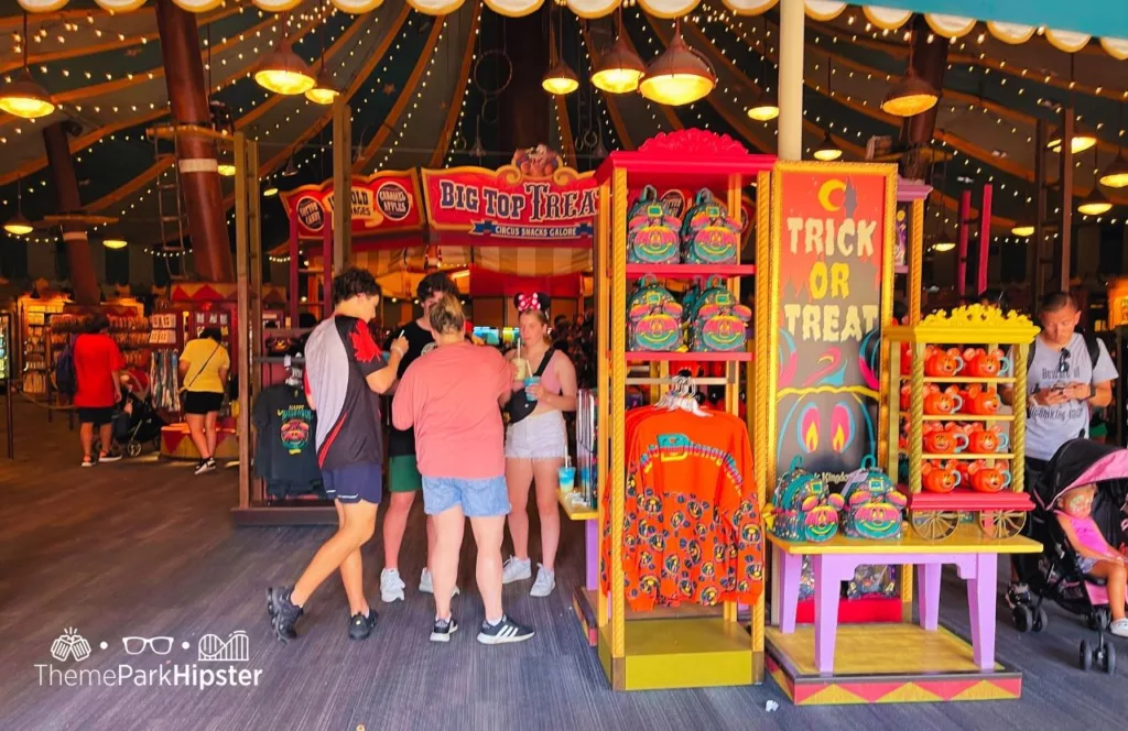 Disney Magic Kingdom Theme Park Fantasyland Big Top Souvenirs Store Halloween Merch with Halloween Loungefly Backpack and Spirit Jersy