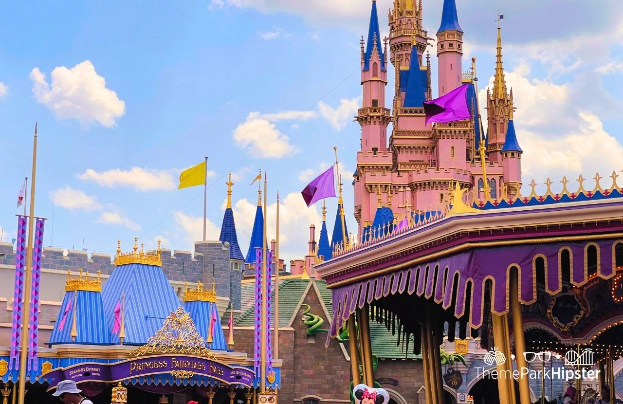 Disney Magic Kingdom Theme Park Fantasyland Carousel Ride and Cinderella Castle. Keep reading to get the best restaurants at Magic Kingdom.