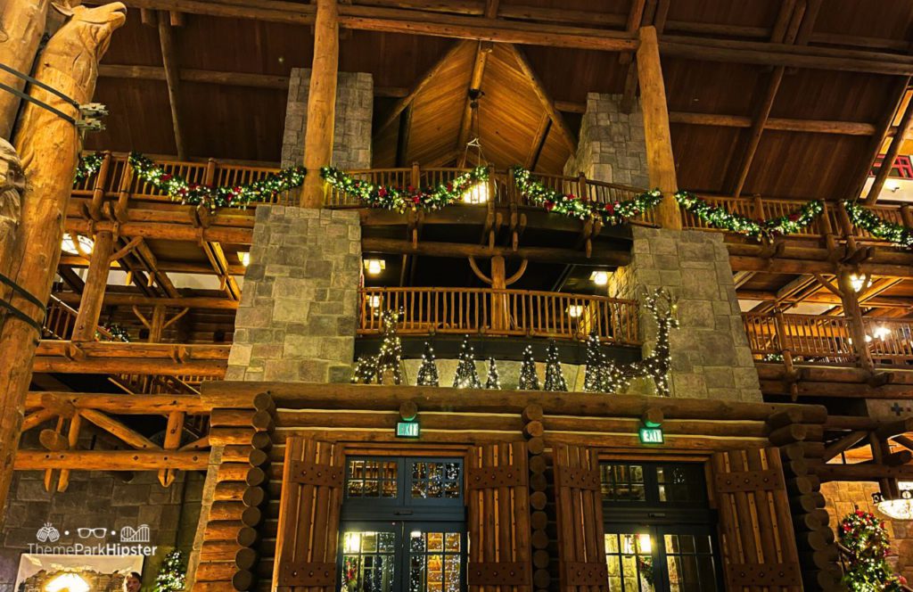 Disney Wilderness Lodge Resort At Christmas Time. Keep reading to find out all you need to know about when does Disney World switch from Halloween to Christmas.