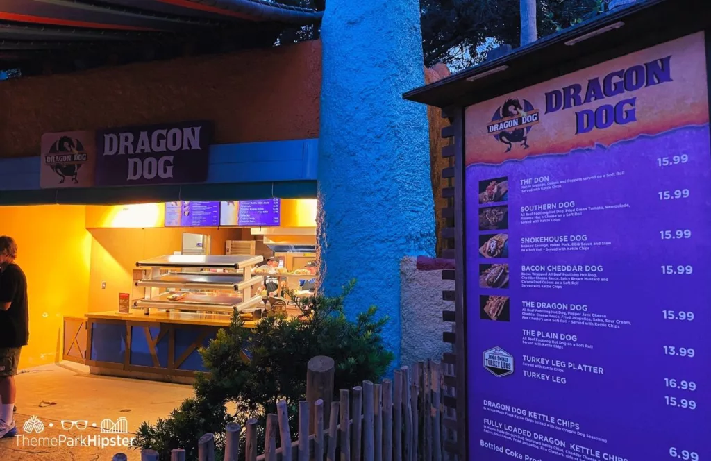 Dragon Dog Restaurant at Busch Gardens Tampa Bay with walk up counter and hot dog warming display and menu. Keep reading discover more about what to eat at Busch Gardens Tampa.