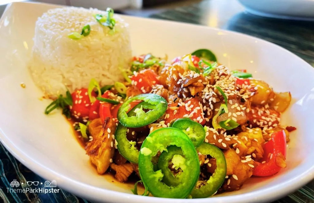 Finn's Restaurant Chicken stir fry with rice. Keep reading to discover more about Encore Resort at Reunion. 