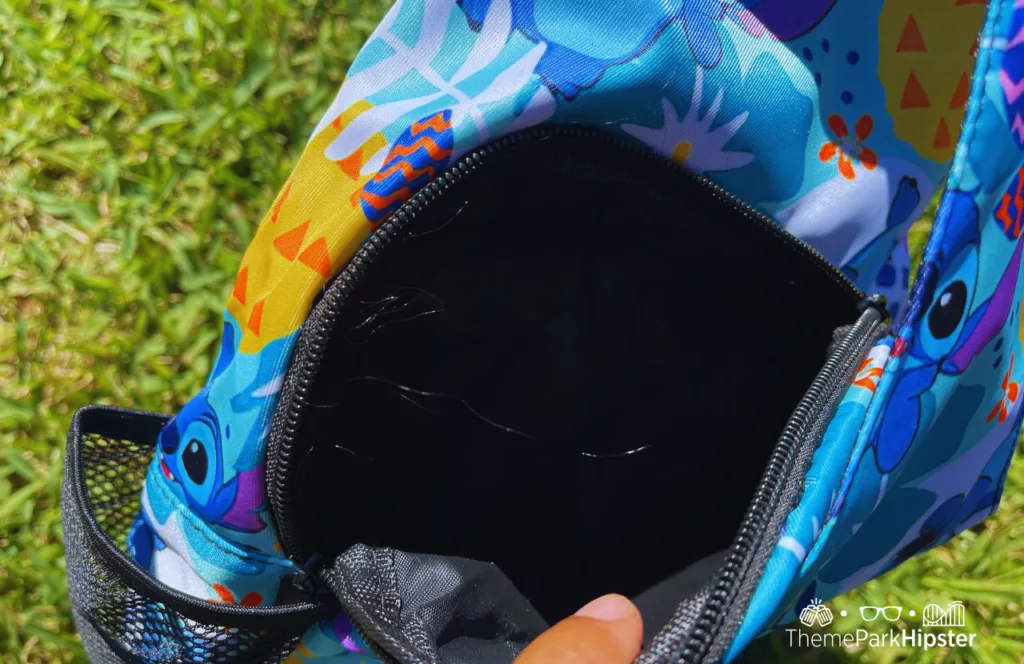 Lilo and Stitch Sling Bag showcasing the spacious interior and strap. Keep reading if you want to learn more about the best purse for Disney.