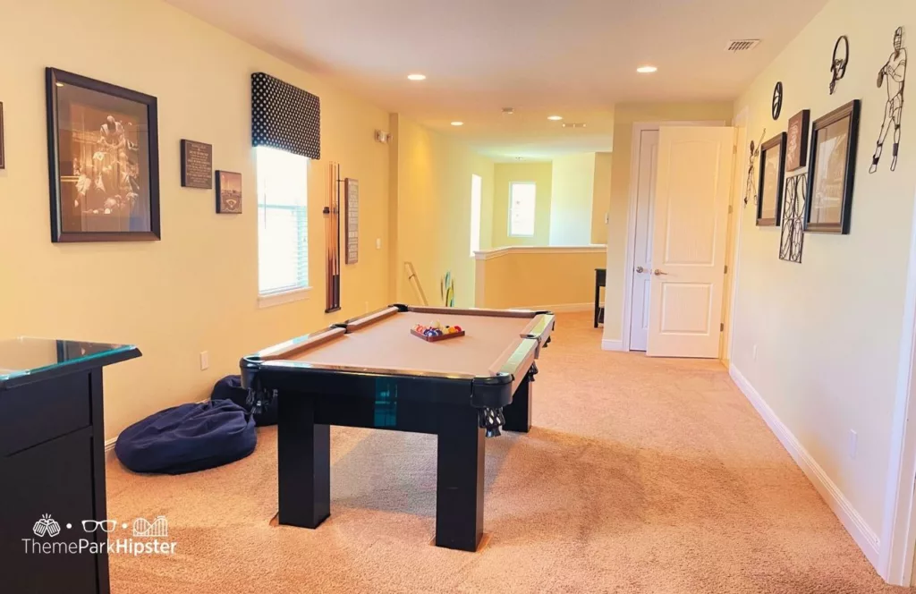 Loft fun room with pool table 5 Bedroom Villa at Encore Resort Review. One of the best vacation home rentals near Disney World