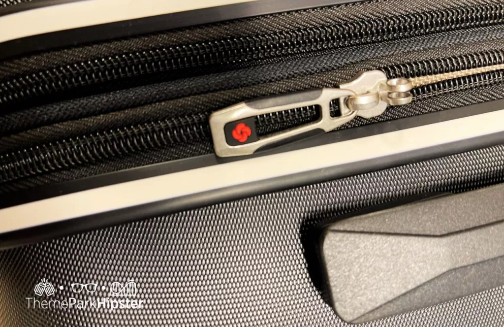 Durable zipper on the expandable Samsonite Gray Hardside Suitcase. Keep reading if you want to know more about the best Disney World luggage.