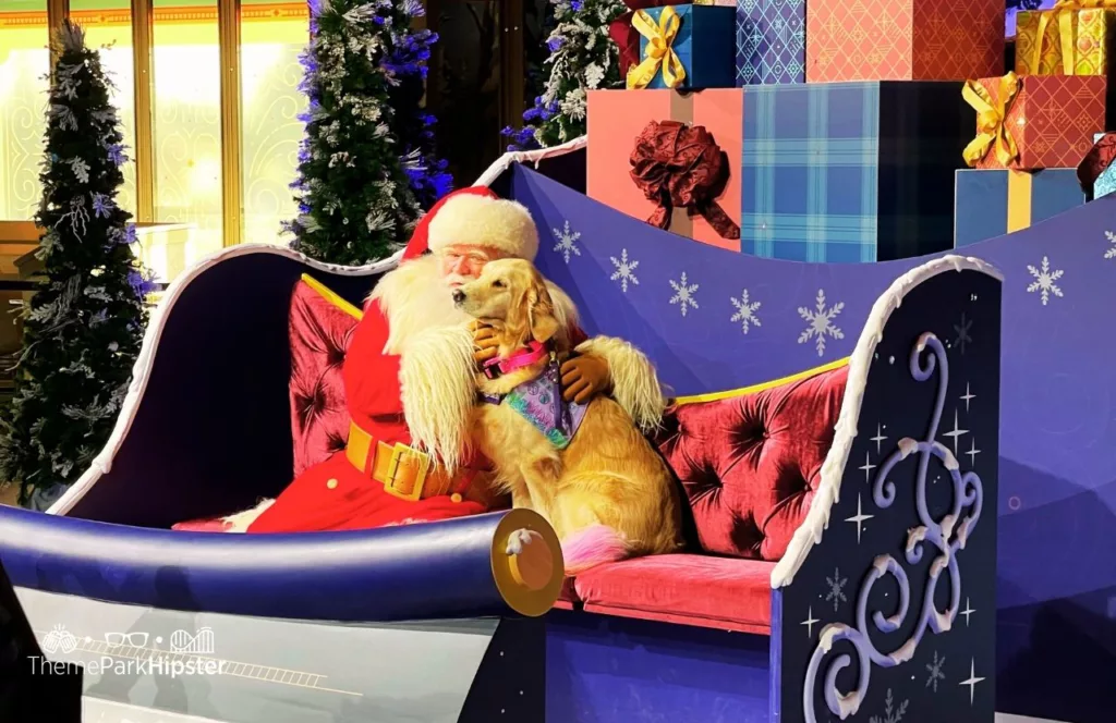 Santa Claus and Dog at Disney Christmas at Epcot Festival of the Holidays 2023