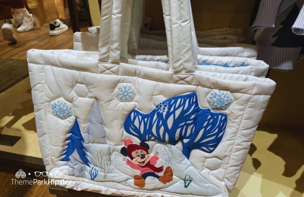 Snowy Blue Holiday Purse. one of the best Disney World souvenirs to buy for your trip!