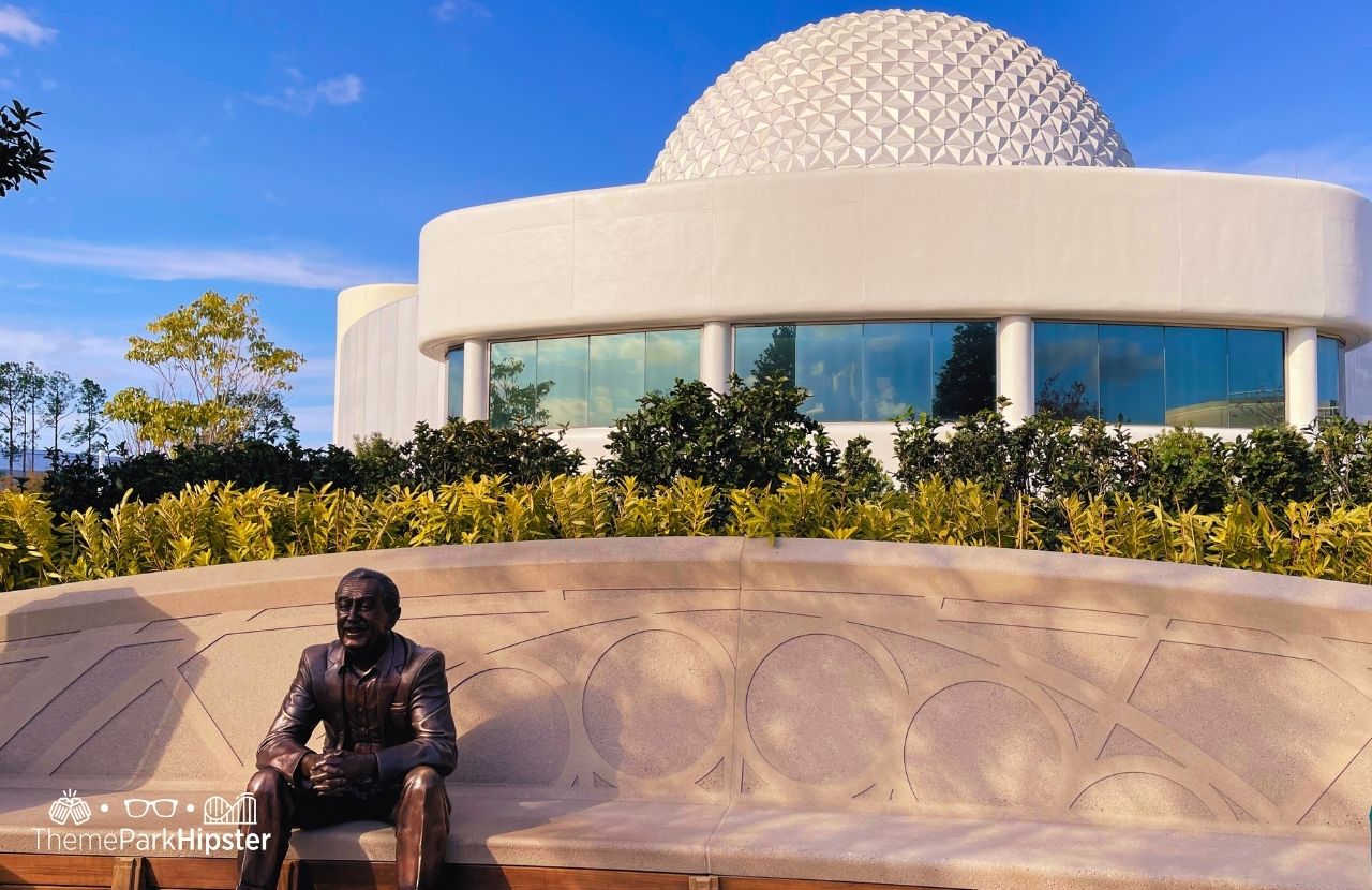 Epcot Theme Park Disney World Spaceship Earth and Walt Disney Statue with his best Quotes on Courage