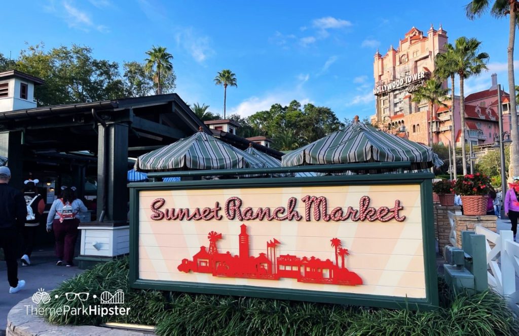 Disney Hollywood Studios Theme Park Sunset Ranch market with tower of terror in the background