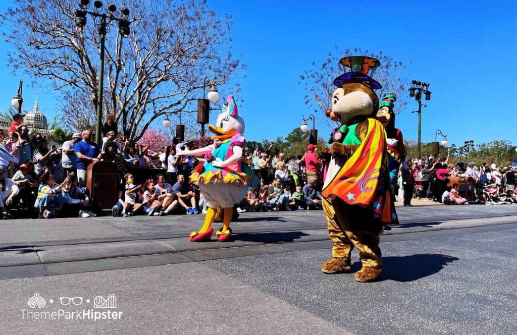 Disney Magic Kingdom Park Disney Festival of Fantasy Parade Daisy Duck Chip and Dale and Goofy. One of the best Disney World experiences you must try!