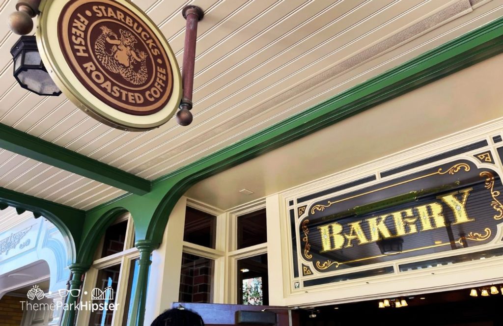 Disney Magic Kingdom Park Starbucks Coffee Shop on Main Street USA. Keep reading to learn more about Disney World Mobile Order Service.