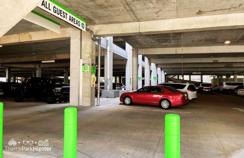 Walt Disney World Disney Springs Lime Parking Garage. Keep reading to discover how much it costs to park at Disney World.
