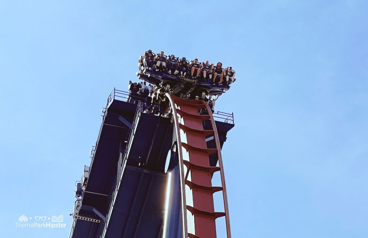 Cedar Point Amusement Park Ohio Valravn Drop Roller Coaster with riders dangling in the air. One of the tallest roller coasters at Cedar Point.