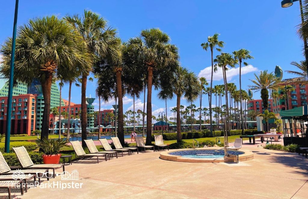 Beachside with lounge chairs and jacuzzi Swan and Dolphin Resort Hotel at Walt Disney World. Keep reading to find out more about Swan and Dolphin Resort at Walt Disney World.