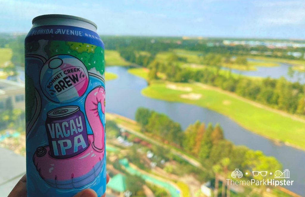 Bonnet Creek Brew IPA overlooking the gorgeous golf course and grounds of Hilton Signia Hotel at Disney World. Keep reading to learn all you need to know about Signia by Hilton Orlando Bonnet Creek.