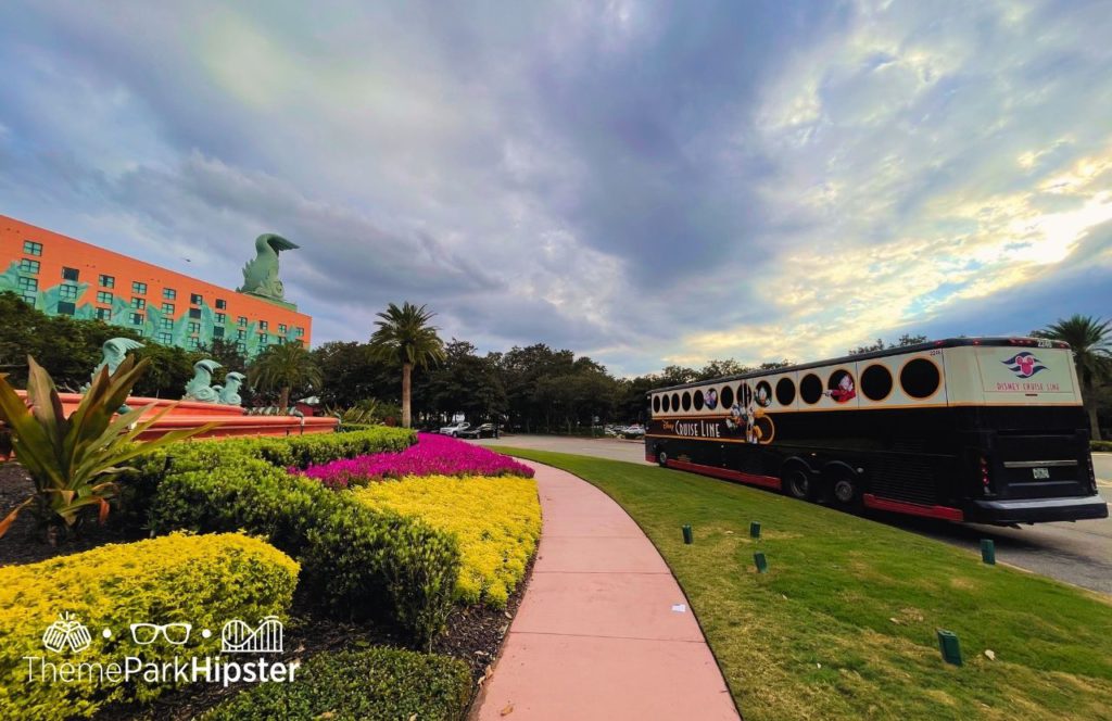 Disney Cruise Line Bus on cloudy day Swan and Dolphin Resort Hotel at Walt Disney World. Keep reading to learn more about Swan and Dolphin Resort Hotel at Disney.