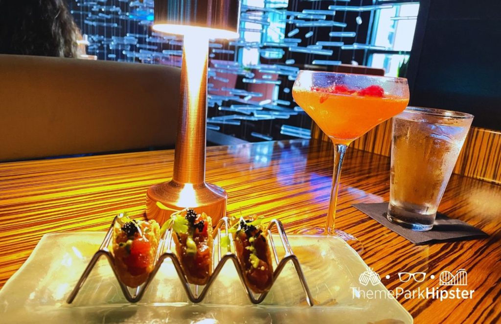 La vie en rose cocktail Todd English's Bluezoo Restaurant bar lounge with tuna tacos Swan and Dolphin Resort Hotel at Walt Disney World. Keep reading for all you need to know about Todd English Bluezoo.