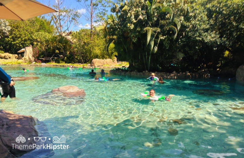 Relaxing lagoon Discovery Cove All Inclusive Water Park at SeaWorld Orlando. Keep reading for the full guide to Discovery Cove All Inclusive Water Park at SeaWorld Orlando.