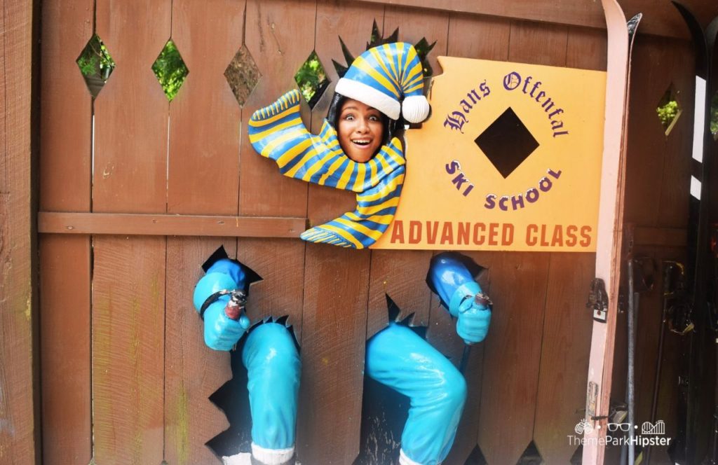 NikkyJ outside of Alpengeist roller coaster at Busch Gardens Williamsburg, Virginia. Keep reading to find out the best beginner tips for visiting Busch Gardens Williamsburg, Virginia.